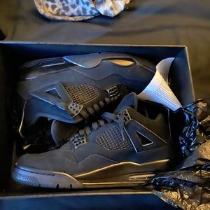 Black Cat Jordan 4s